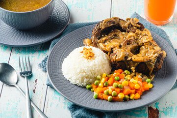 Bulalo Steak – is a famous Filipino dish where beef shanks are boiled then grilled topped with gravy mushroom sauce. 