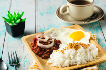 Cornedsilog- Corned beef, fried rice and fried egg 