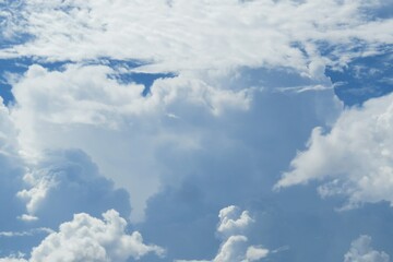Fototapeta premium Heart shape cloud in the sky, natural clouds background