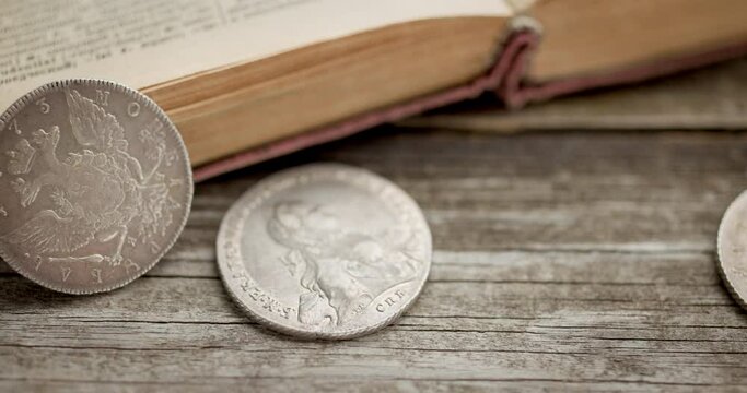 Numismatics. Old collectible coins on the table.