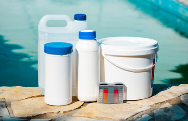 Close up photo of equipment for testing the quality of pool water and chemical cleaning products at...