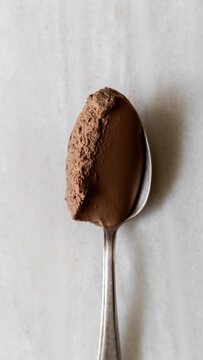 Chocolate mousse on a spoon