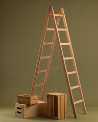 Wooden ladder and wooden box on khaki background
