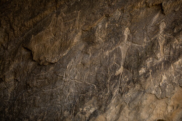 Aincent patterns on rocks in National Historic Museum at Gobustan Azerbaijan