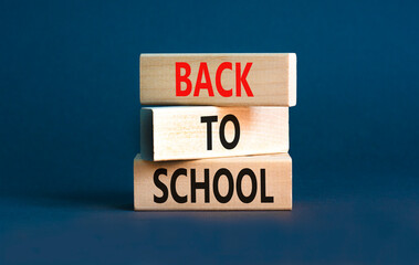 Back to school and support symbol. Concept words Back to school on wooden blocks. Beautiful grey...