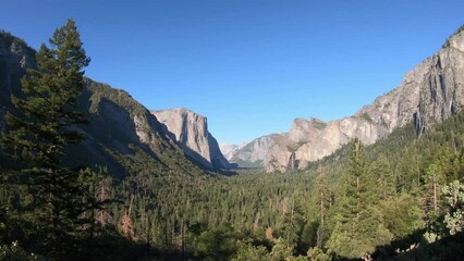 SLOW MOTION SHOT - The view of the Yosemite National Park from the tunnel entrance to the Valley, California, USA. Yosemite Valley as seen from Tunnel View.