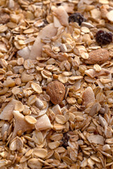 Healthy homemade cereal granola muesli with oats, nuts, dry berries.
