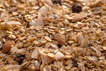 Healthy homemade cereal granola muesli with oats, nuts, dry berries.