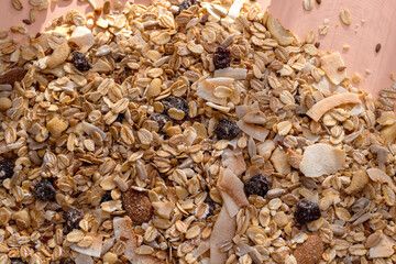 Healthy homemade cereal granola muesli with oats, nuts, dry berries.