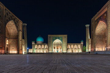 SAMARQAND, UZBEKISTAN - JUNE 11, 2022: View of Registan square in Samarkand at night - the main...