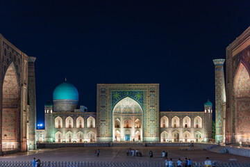 SAMARQAND, UZBEKISTAN - JUNE 11, 2022: View of Registan square in Samarkand at night - the main...