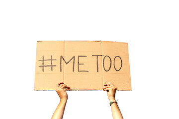 Two woman's hands holding a cardboard sign that says me too, No sexism concept.