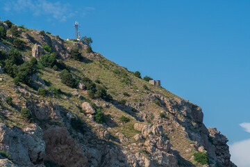 Fototapeta premium Mountains fortress balaklava bay cembalo crimea flying balaclava nature rock, concept sky summer for sevastopol for architecture building, europe view. Crimean embankment sun,