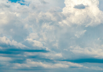 Dark rain clouds in grey sky