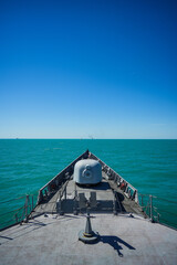 Bow deck of a military ship with artillery © bizoo_n