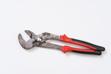 Rusty lock pliers on white background