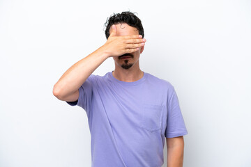 Young man with moustache isolated on white background covering eyes by hands. Do not want to see...