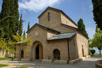 Fototapeta na wymiar The Church of Saint George with the tomb of St. Nino at the Monastery of St. Nino at Bodbe, Georgia
