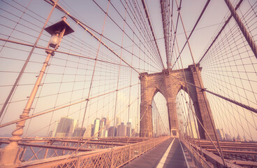 Naklejka premium Retro stylized picture of the Brooklyn Bridge, New York City, USA.