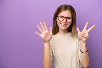 Young English woman isolated on purple background counting eight with fingers
