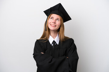 Young university graduate English woman isolated on white background looking up while smiling