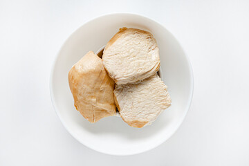 chicken fillet in the white bowl