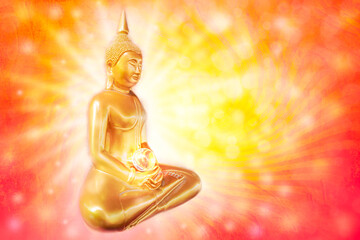 Buddha statue with lighting and bokeh on orange color sunburst background.