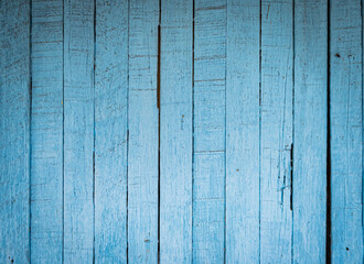 Naklejka premium Light blue wall of old wooden planks with cracks. Vintage style texture and background concept.