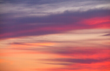 Naklejka na ściany i meble Colorful clouds at sunset - abstract sky background