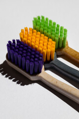 Toothbrushes on a colored background top view. Oral hygiene. closeup