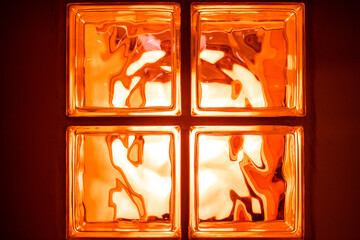 Orange Glass Block Wall,Transparent glass block or tiled mosaic wall for background.Perfect for texture, background, or as a design element.