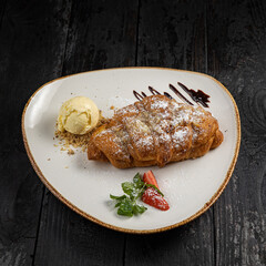 delicious croissant with chocolate and ice cream