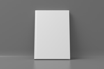 Blank vertical hardcover book cover mockup standing on gray background