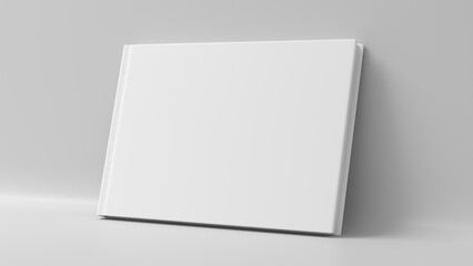 Blank horizontal hardcover book cover mockup standing on white background