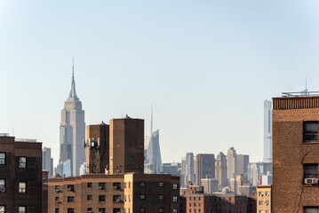 Plakat View of the Empire State Building Behind Brick Construction Residential Buildings