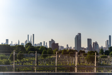View of the New York Manhattan Skyline With Small Cementary in the foreground