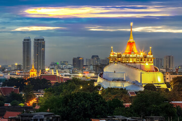 Golden Mount Temple Fair, Golden Mount Temple with red cloth in Bangkok at dusk (Wat Sraket, Thailand)