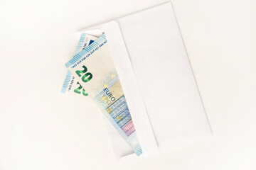 Bunch of Euro's. Close-up. Saving money. Keeping savings at home. Open envelope with Euro banknotes out from it. Finance, savings, investing. Money management at home. Financial business concept.
