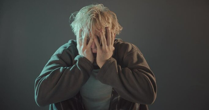 Crying and screaming his pain out