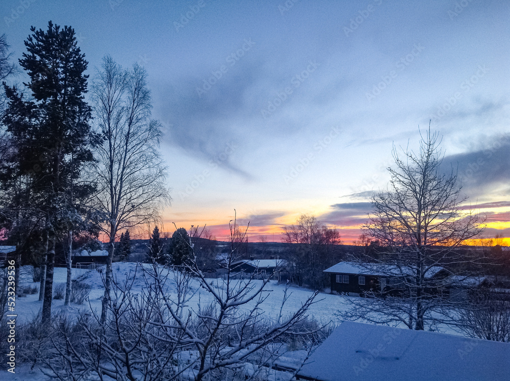 Wall mural winter sunset in ås village in jamtland, sweden