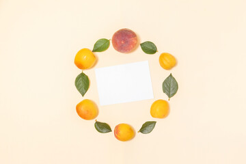 White card mockup on yellow background with bright tropical fruits and leaves