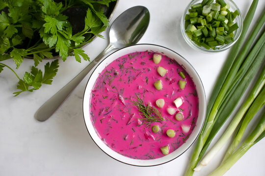 Cold beetroot soup on a light background