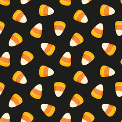 Seamless pattern with candy corn. Halloween sweets seamless pattern.