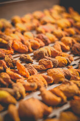 The process of home cooking dried fruits in an electric dryer.