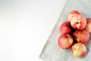 Apple nectarine - Nectarine crossed with apple, on a white table.