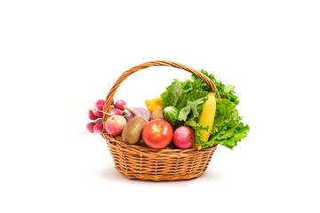 Fruits and vegetables in a wicker basket white background.