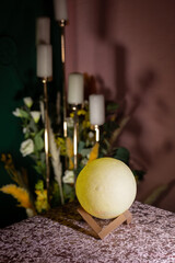 Moon lamp on the desktop in a dark room