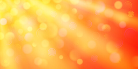 Obraz premium Abstract background in orange colors with diverging rays of light and small translucent circles with bokeh effect