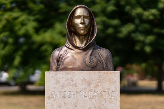 Portrait of the statue of Satoshi Nakamoto mysterious founder of Bitcoin