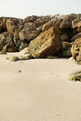 Fototapeta na wymiar large rocks on the beach
